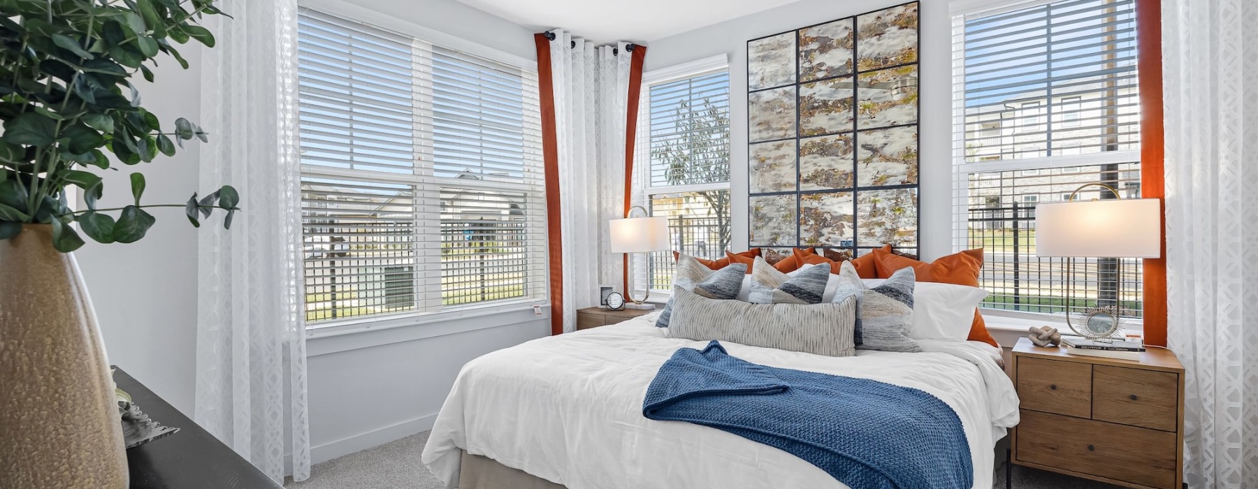 Bedroom with natural lighting and high ceilings